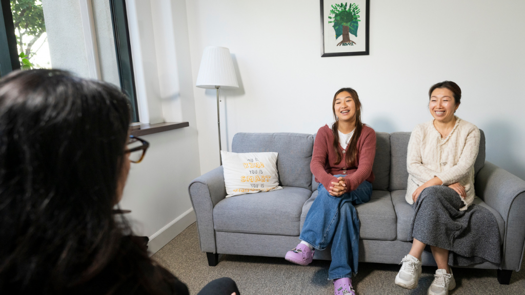 teen meets with school psychologist
